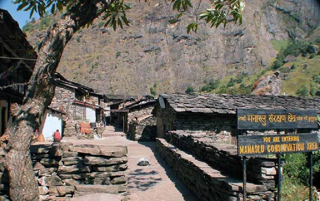 ntry sign to Manaslu Conservation Area near Mount Manaslu location