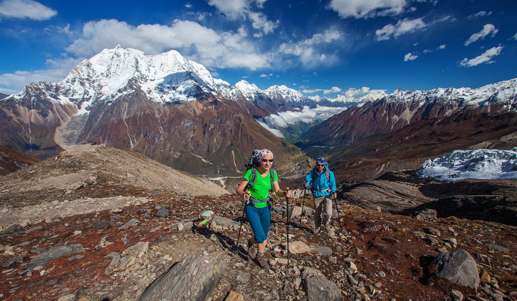 Two hikers walking on the Manaslu trail in Nepal