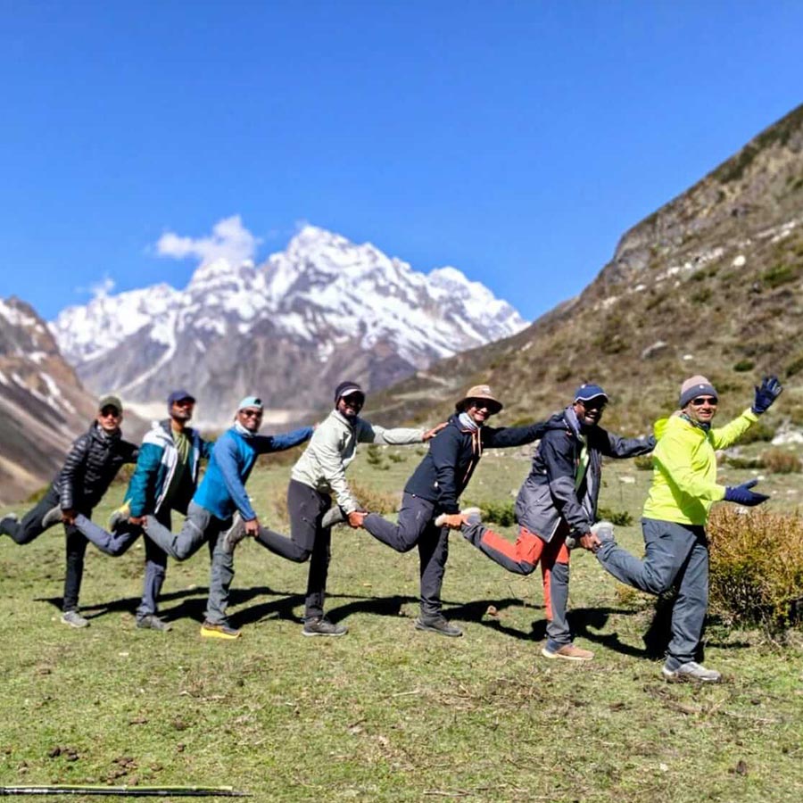 A cheerful group of trekkers from India enjoying every step of the Manaslu Circuit, surrounded by spectacular Himalayan landscapes and unforgettable moments along the trail.